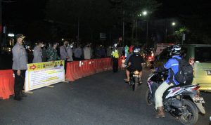 Polisi Bersama Aparat Gabungan cegah  Penyebaran Covid-19