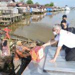 Alumni Akpol 92 POLDA  Kalsel berbagi dengan Warga ISOMAN