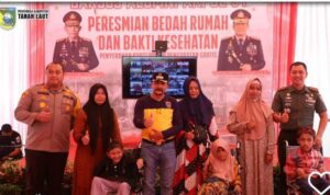 Buat terharu Pj Bupati Tala,  atas pemberian kursi roda dan bedah rumah dari POLRI